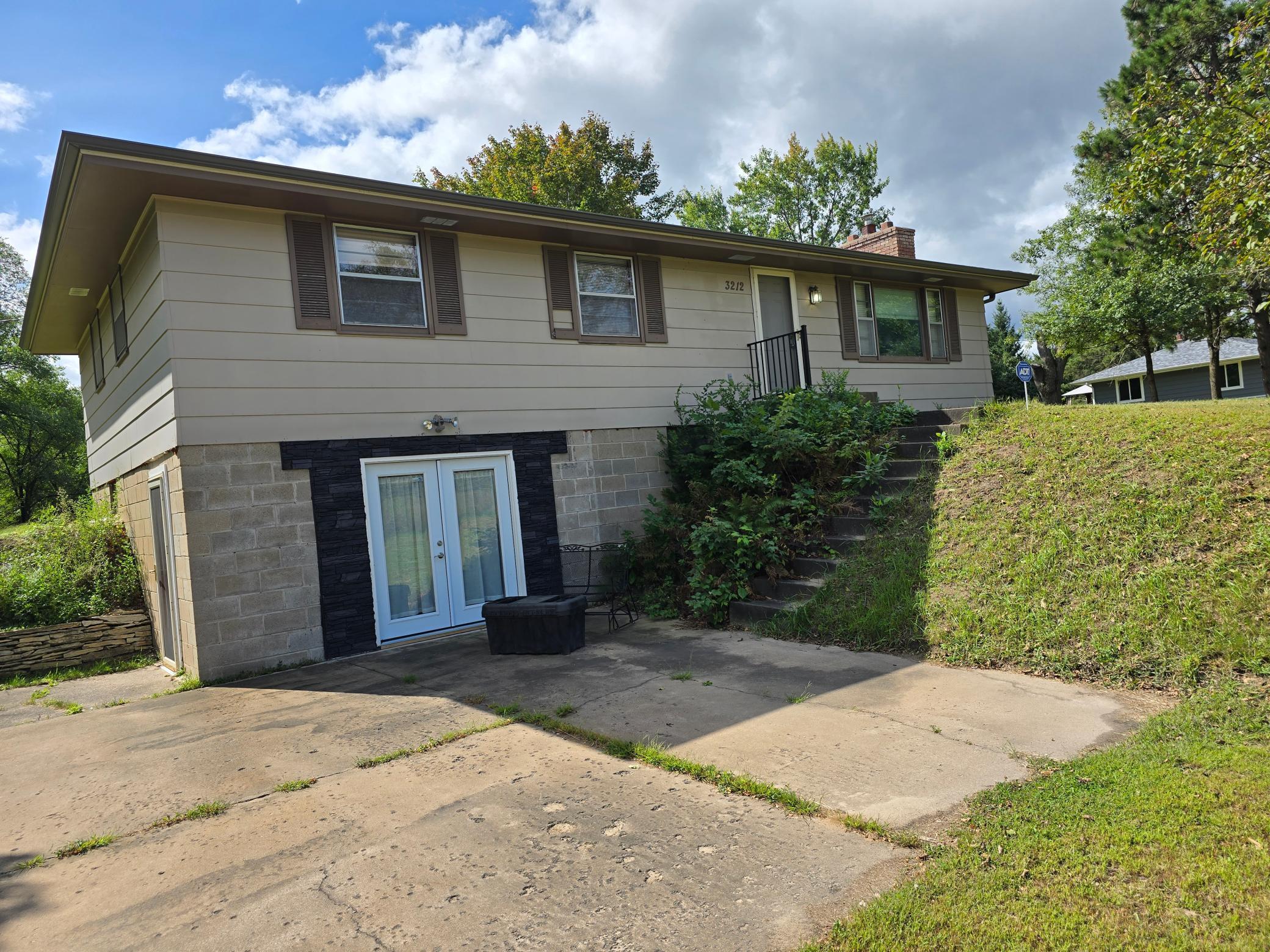 Bright walk-out lower level features a large bonus room with endless possibilities—set up a pool table, fitness area, or your own entertainment zone and more