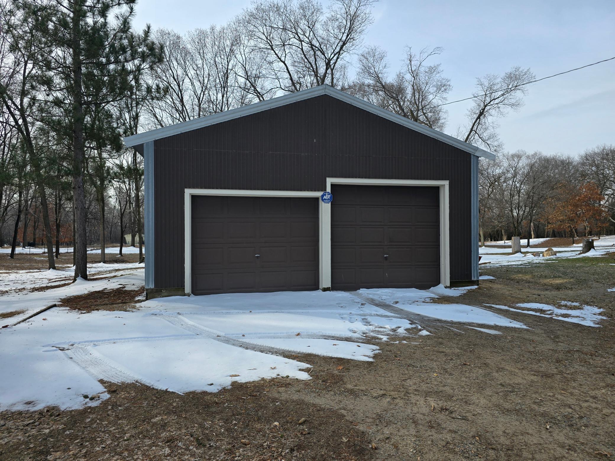 30 x 24 Garage/Pole barn is large enough for at least 3 cars and all your " toys " to boot.