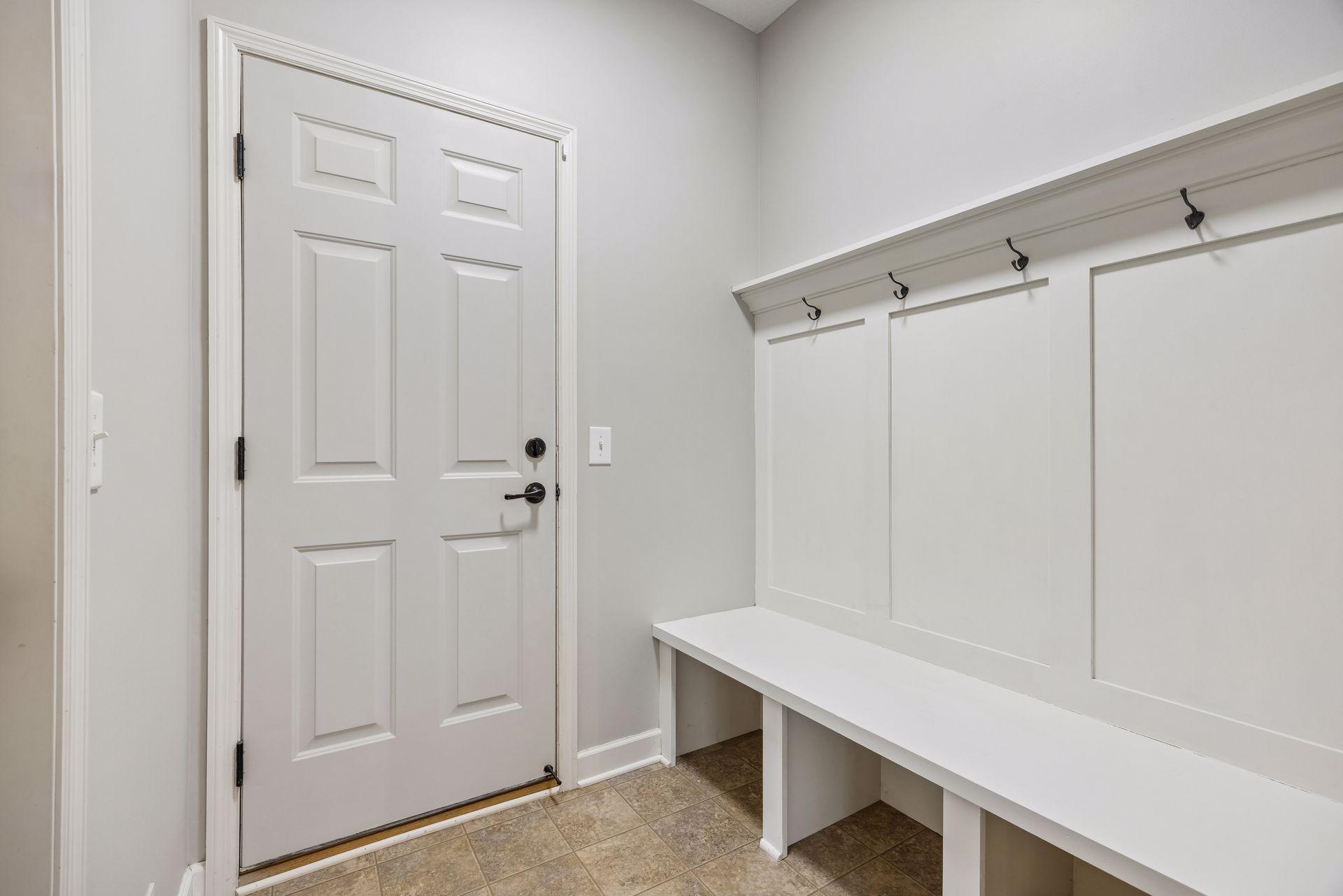 Main Level Mud Room with Built In Boot Bench