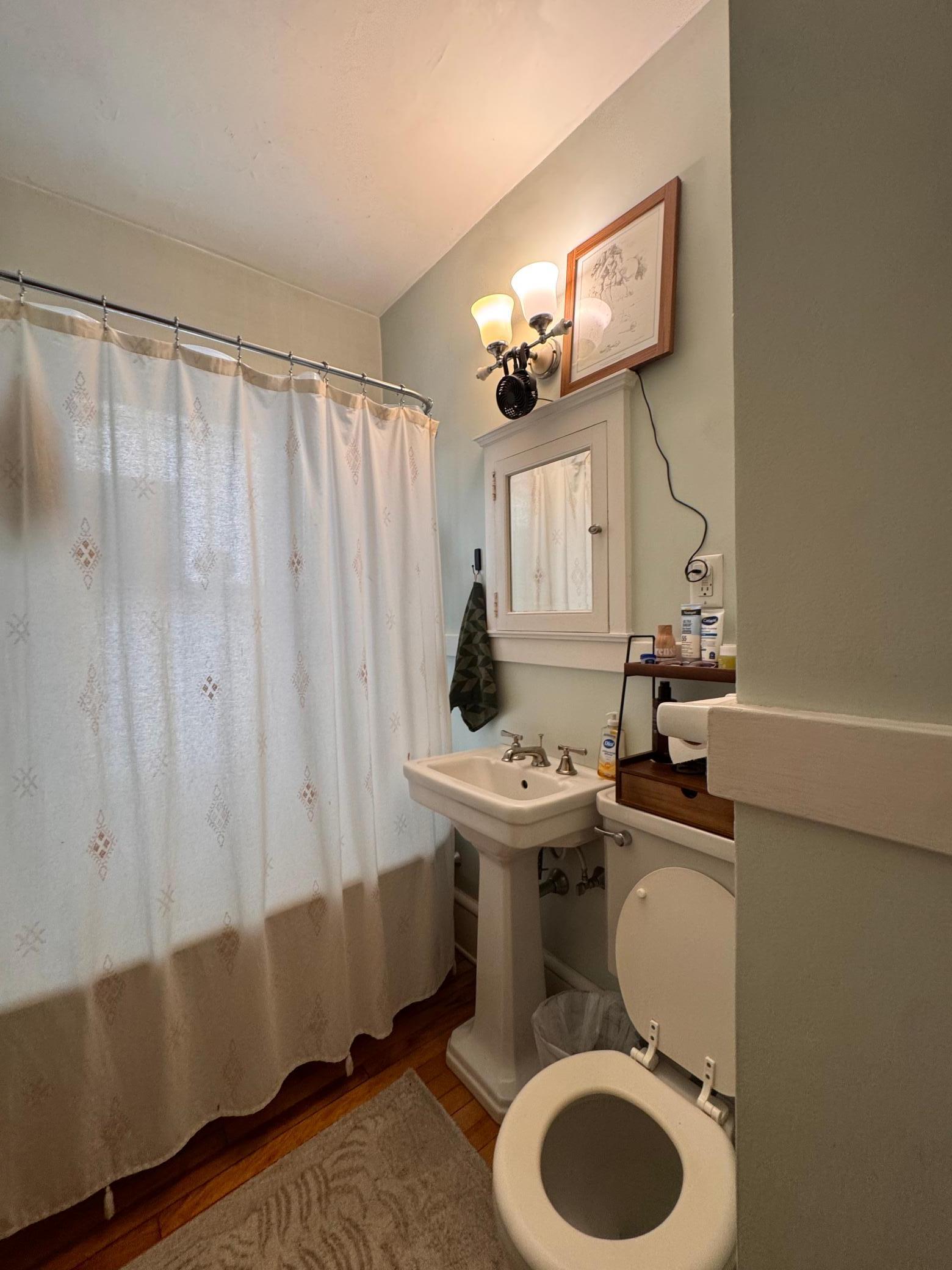 Each bathroom retains its vintage charm with original features such as claw foot soaking tubs and built-in medicine cabinets.