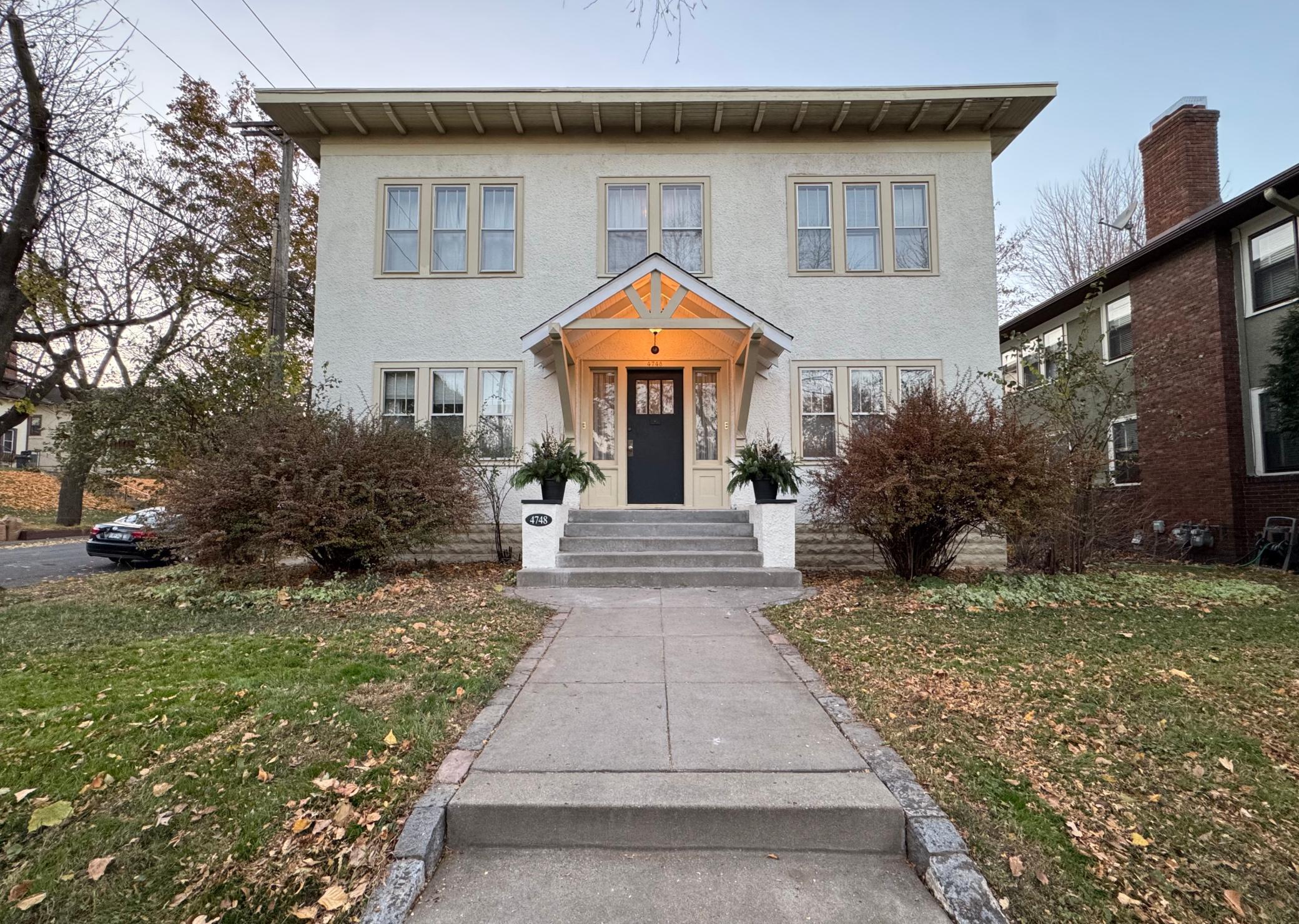 This 4-plex features a charming front entrance in a very walkable location close to tons of restaurants, cafes, & coffee shops.