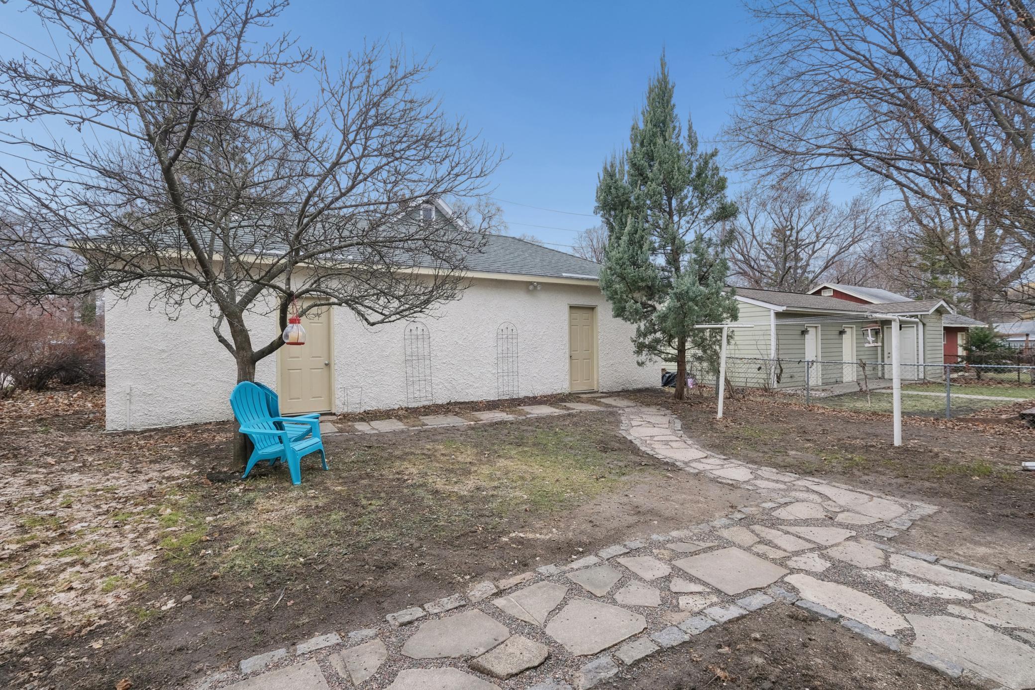 Backyard view of 4 car garage.