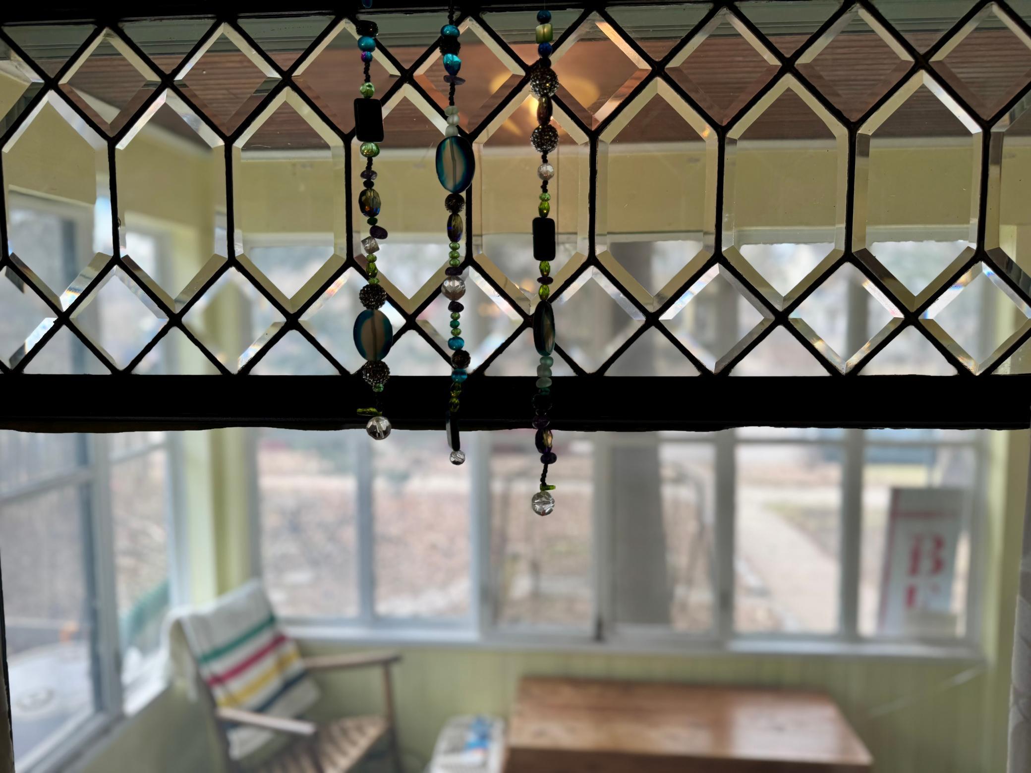 One of 6 bevelled glasses windows