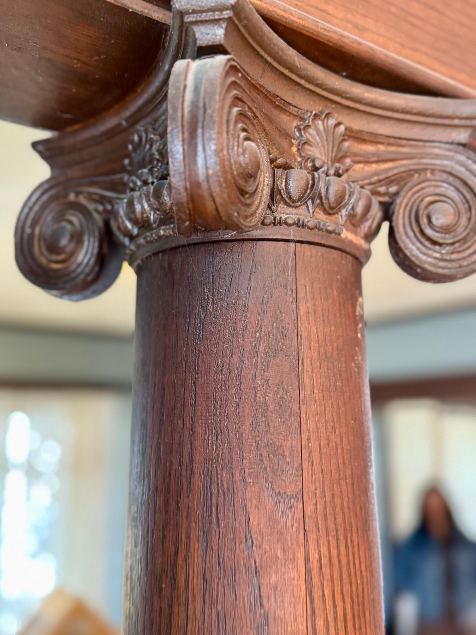 original wooden columns with ionic capitals