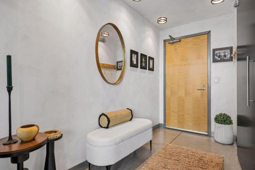 Welcoming entryway, spacious enough for a small table and benchâperfect for a stylish drop zone and easy shoe removal.