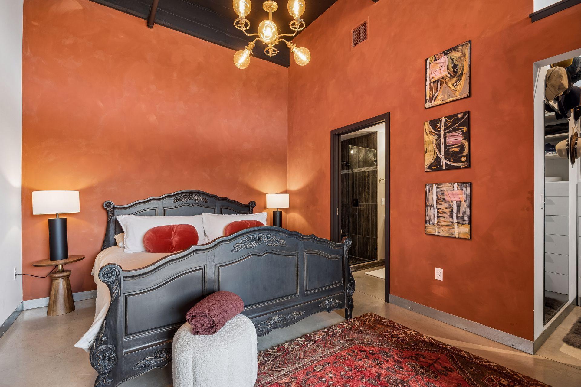 Its moody ambiance, elevated lighting, and generous proportions create a calming escape, while the renovated bath and custom walk-in closet enhance the elevated living experience.