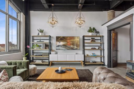 Welcome to this extraordinary North Loop residence located in the iconic Tower Lofts building.