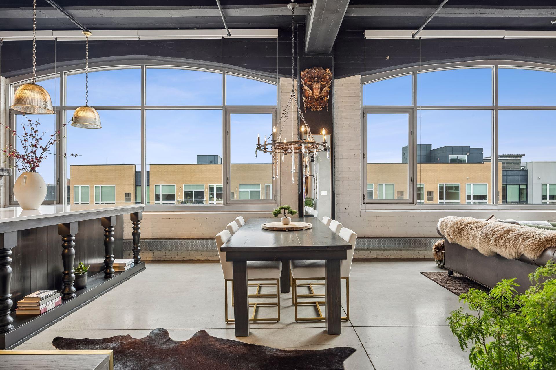 Welcome to this extraordinary North Loop residence located in the iconic Tower Lofts building.