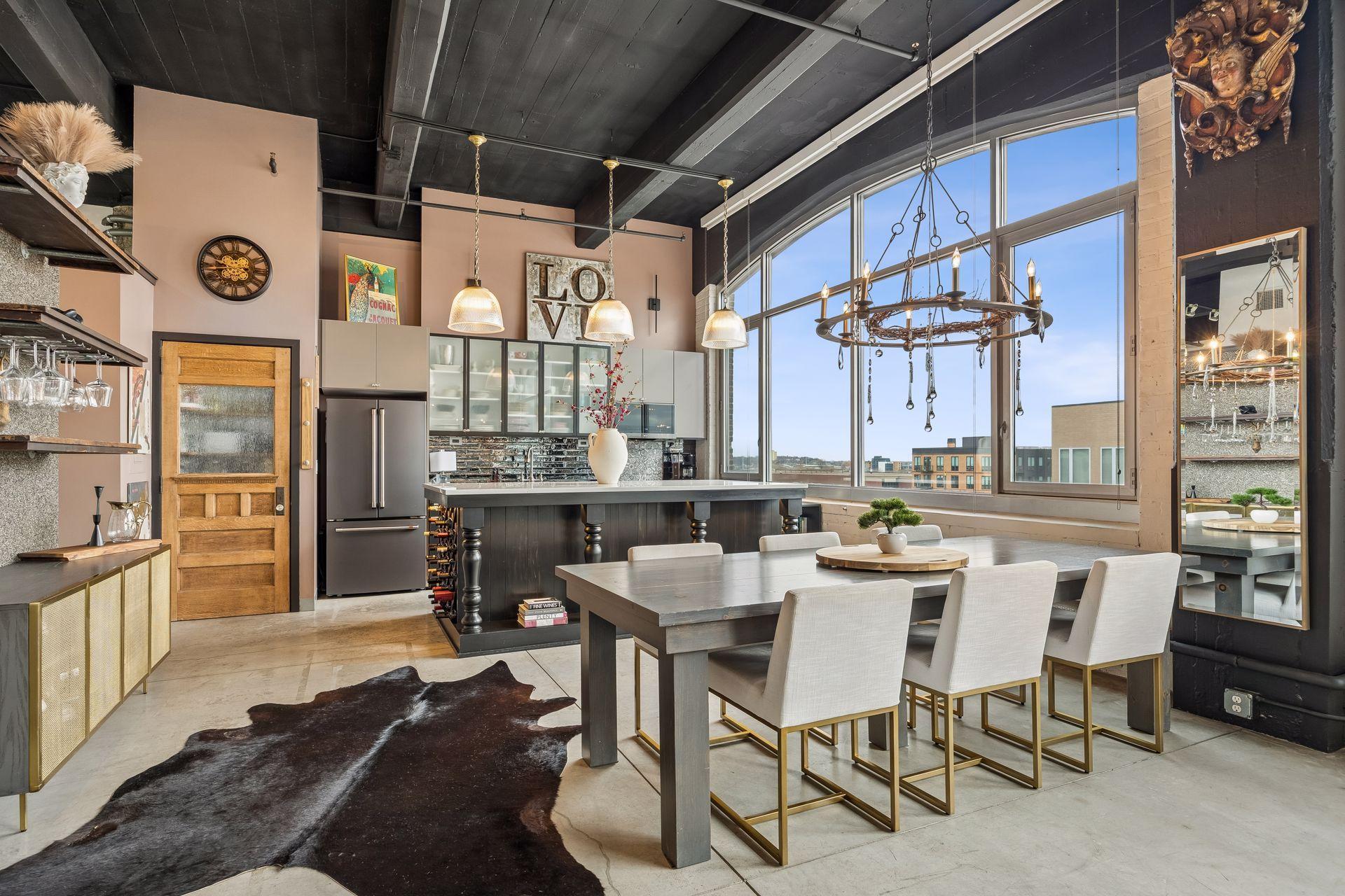 To the left of the refrigerator, a salvaged pantry door introduces character and a subtle architectural focal point.