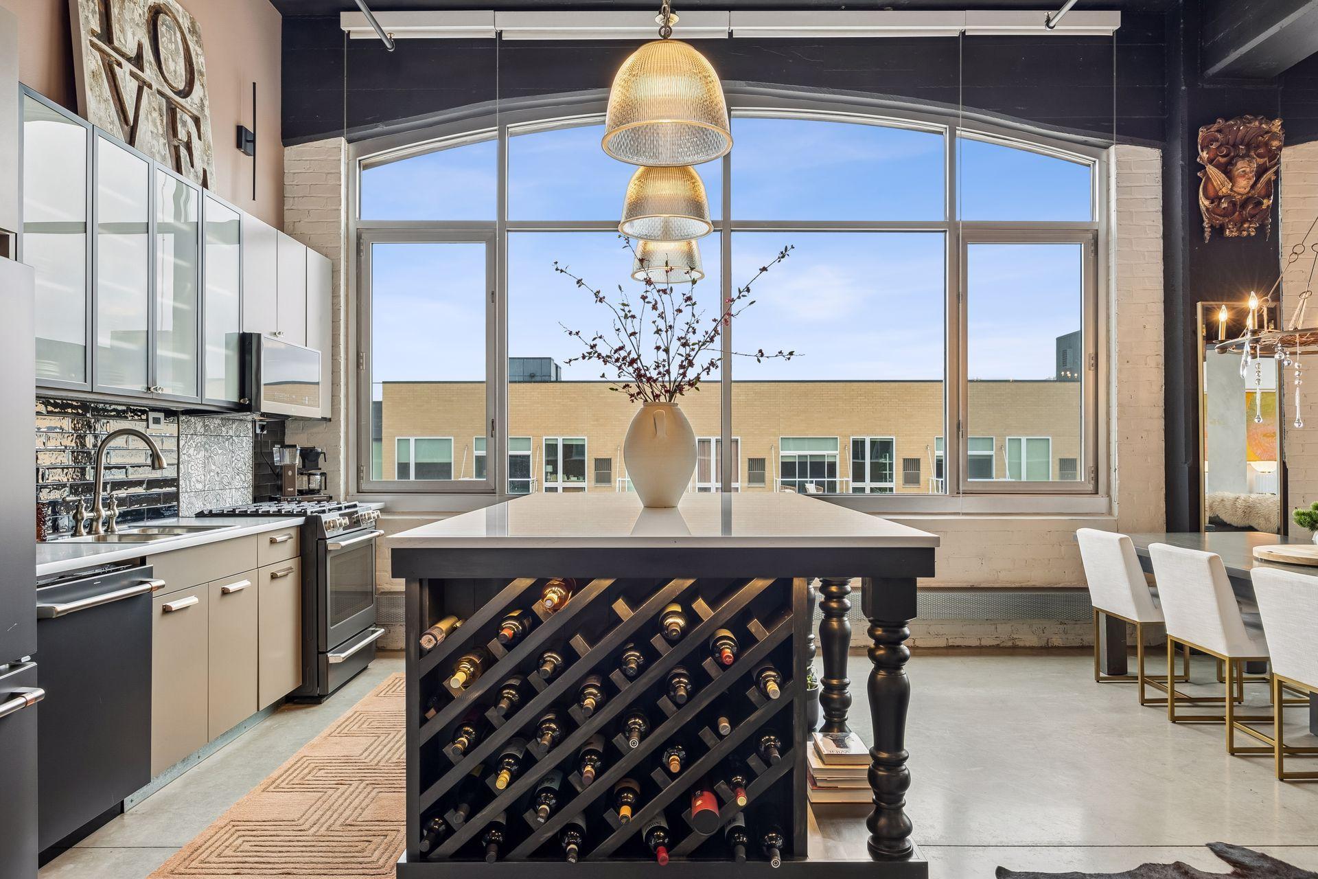 A straight-on view of the island highlights the integrated wine rack—an intentional detail that blends function with design.