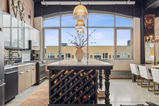 A straight-on view of the island highlights the integrated wine rackâan intentional detail that blends function with design.