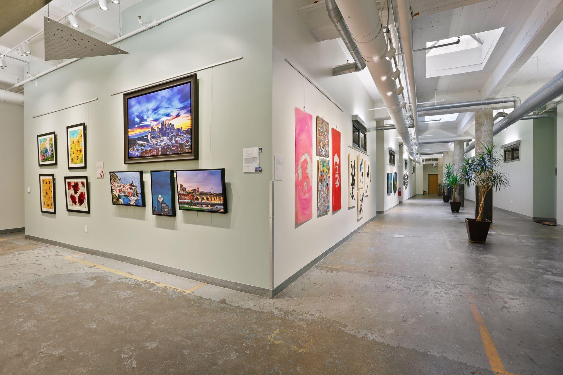 The building’s second-floor art gallery is a curated space that brings creativity and culture into daily life.
