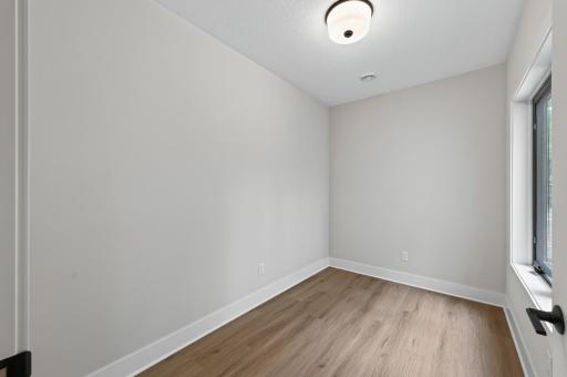 Work from home or unwind in this light-filled flex room with endless possibilities.