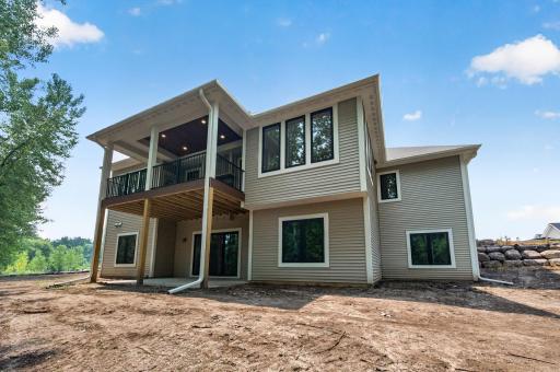 Step outside and enjoy the best of indoor-outdoor living. This home features a stunning covered maintenance-free deck with a beautiful wood-paneled ceiling and recessed lightingâperfect for morning coffee, evening sunsets, or entertaining in any seas