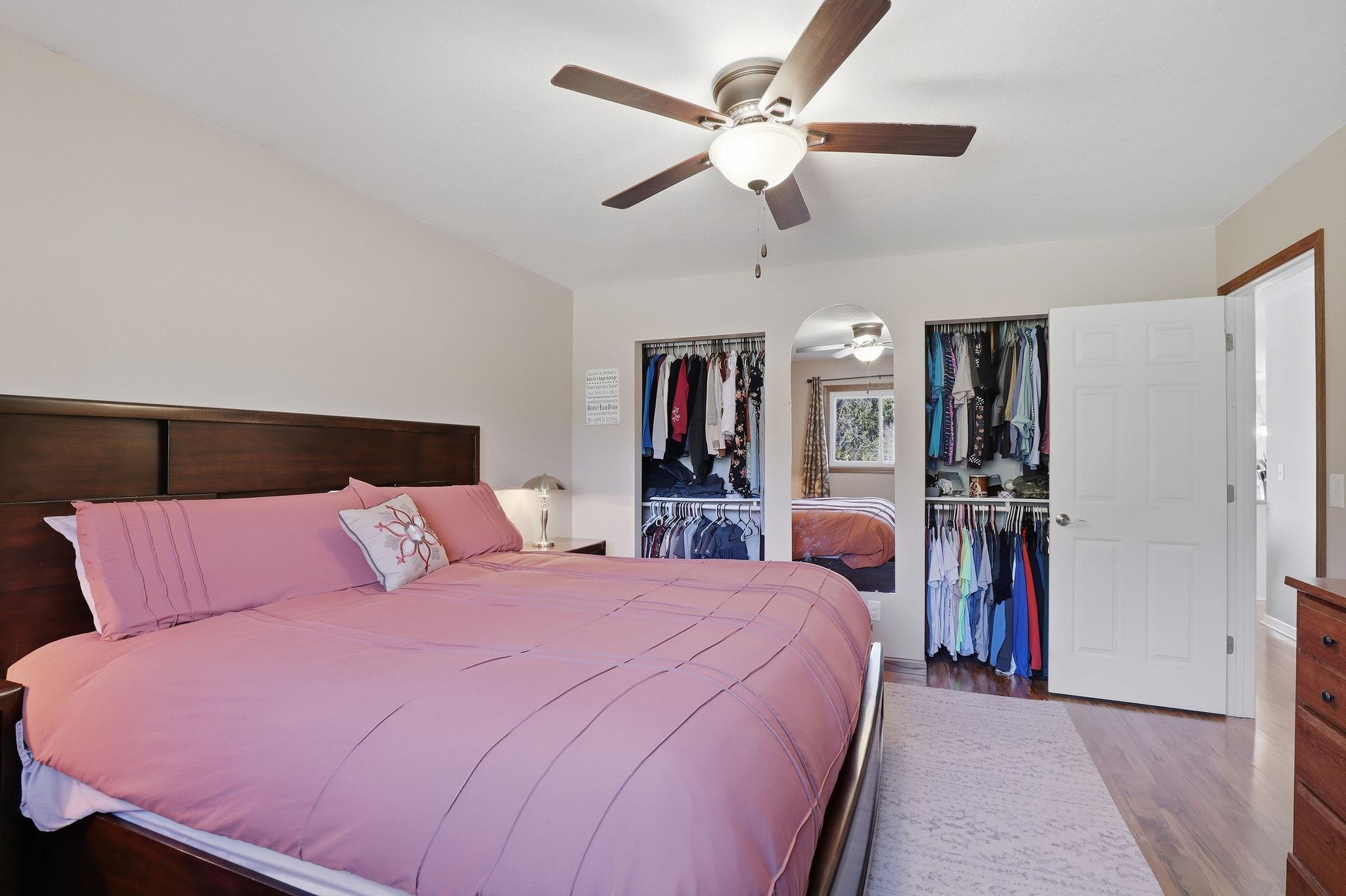 No fighting over closet space - his & hers closets.