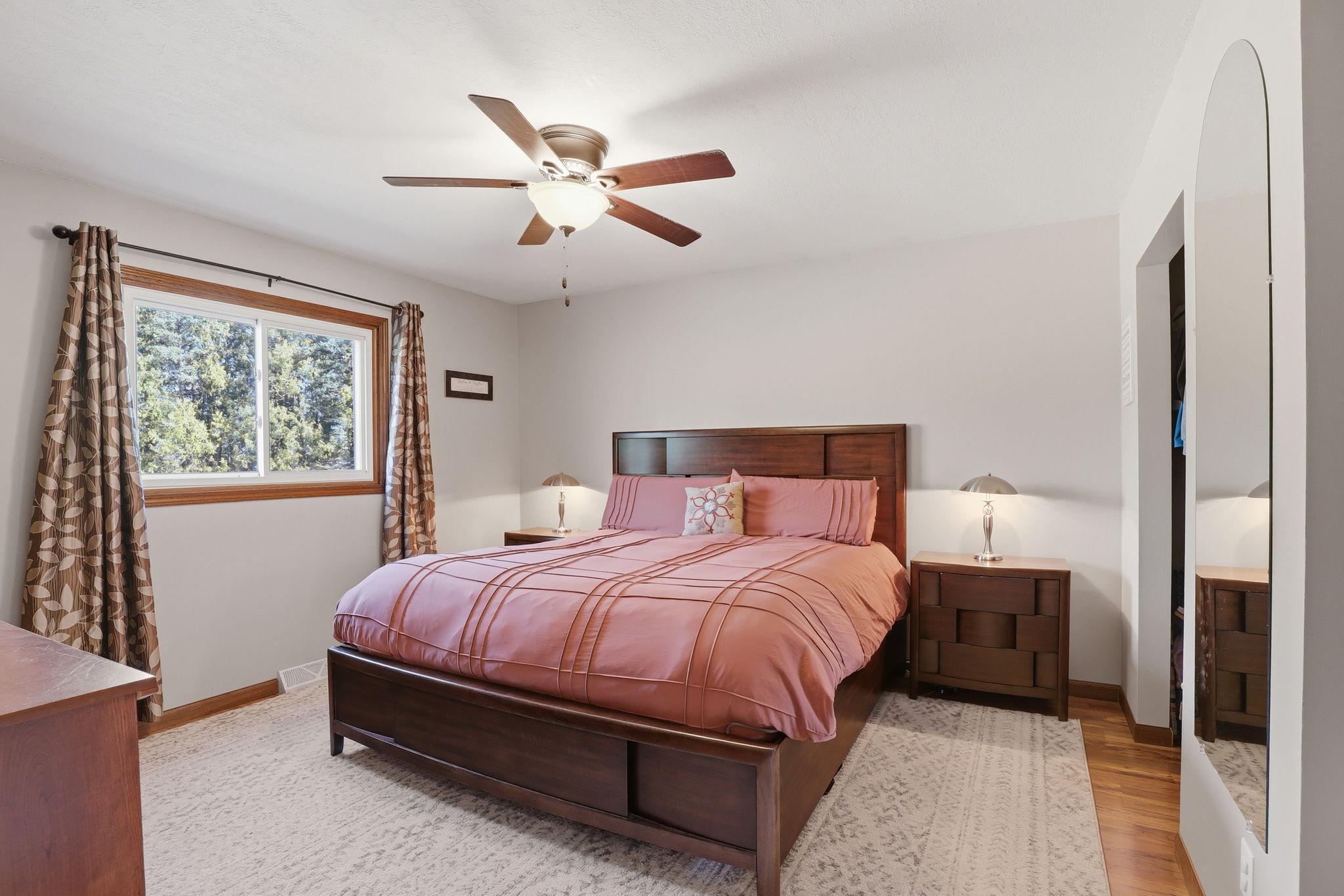 Very spacious master has a king bed with plenty of room to spare.