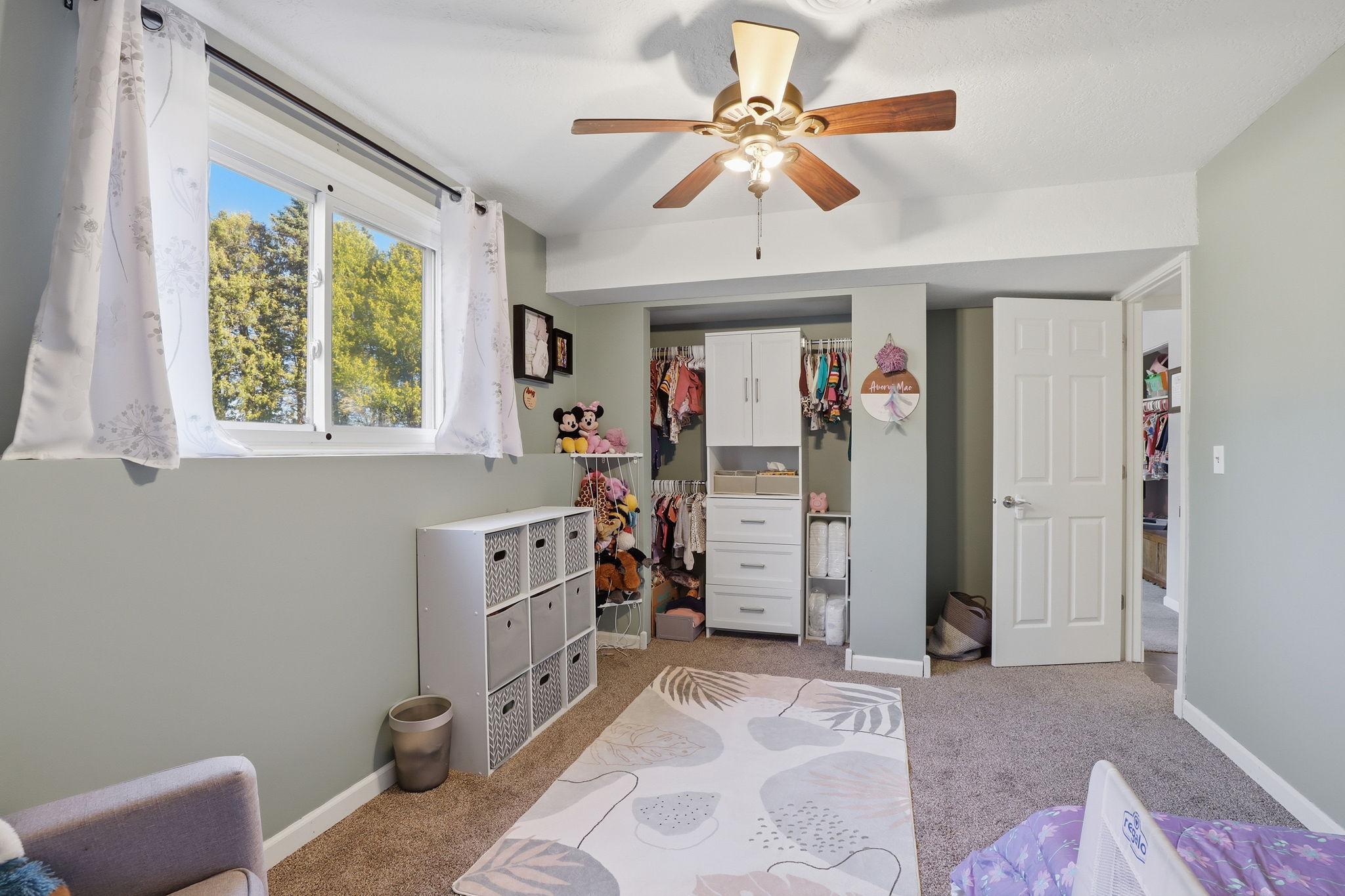 Another nice sized closet with built-in organizer and drawers.