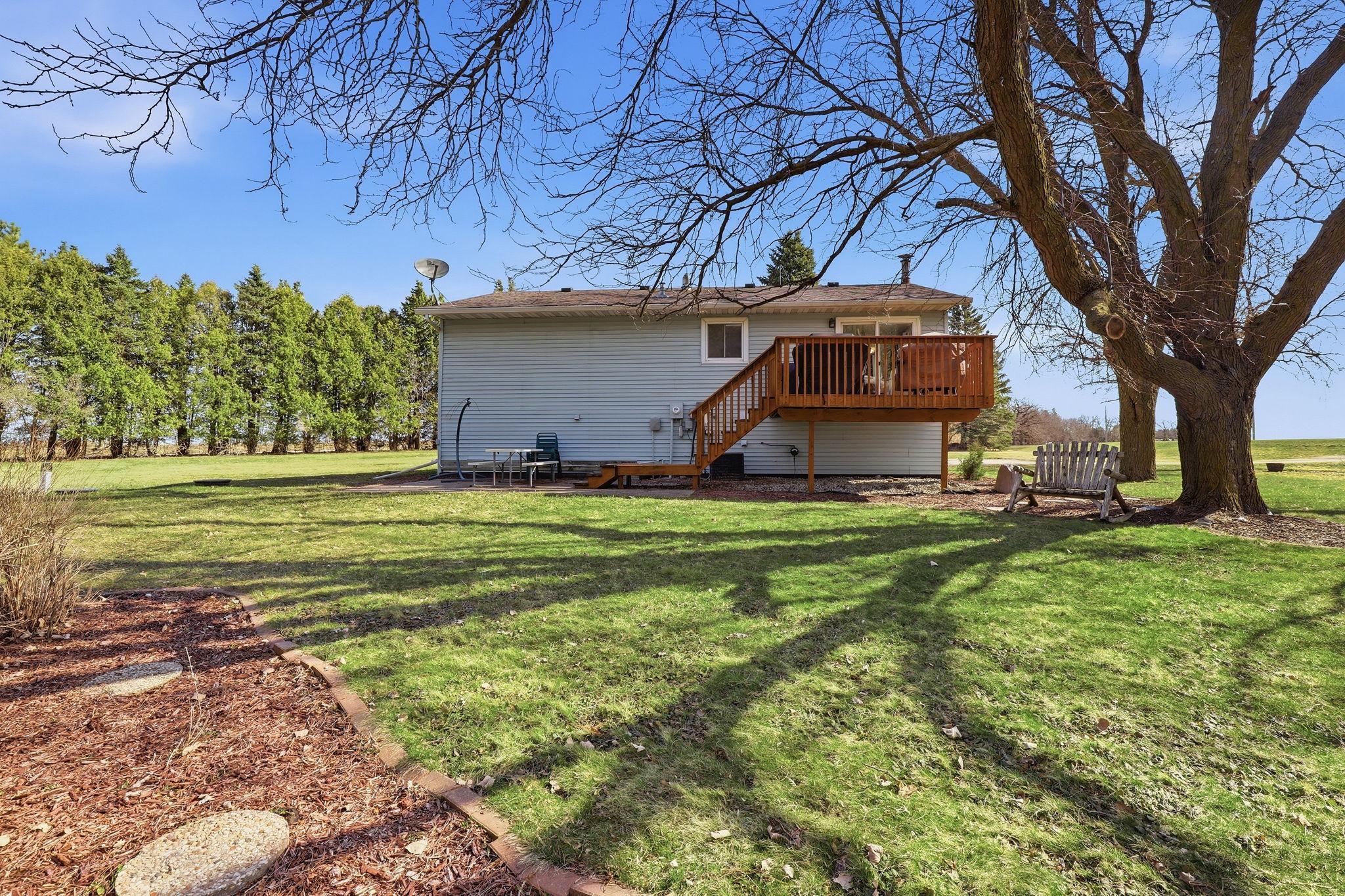 Enjoy the nice deck & the aggregate patio.