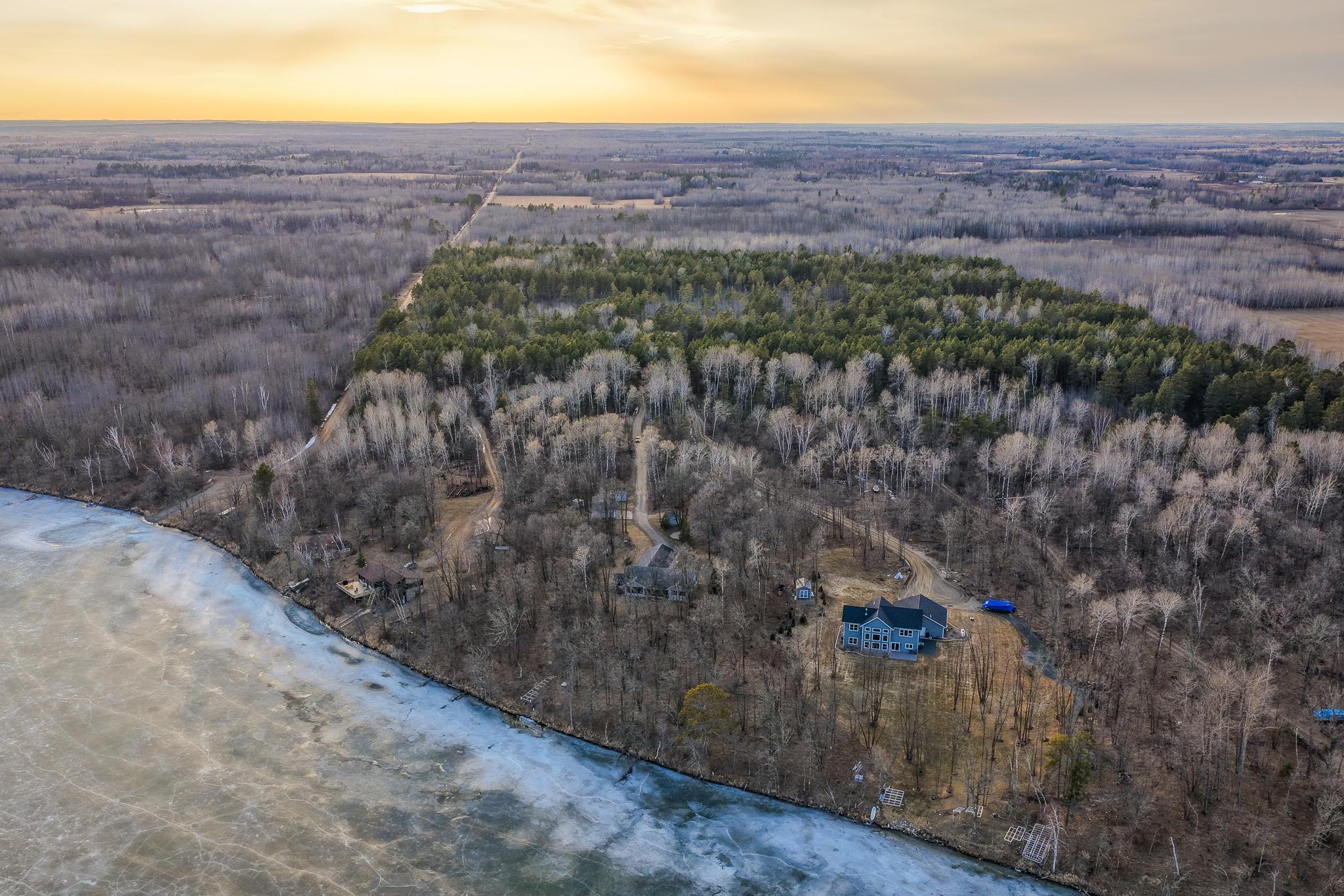 Nestled within the trees is this Hennepin Lake Hideway. Located near the public boat access