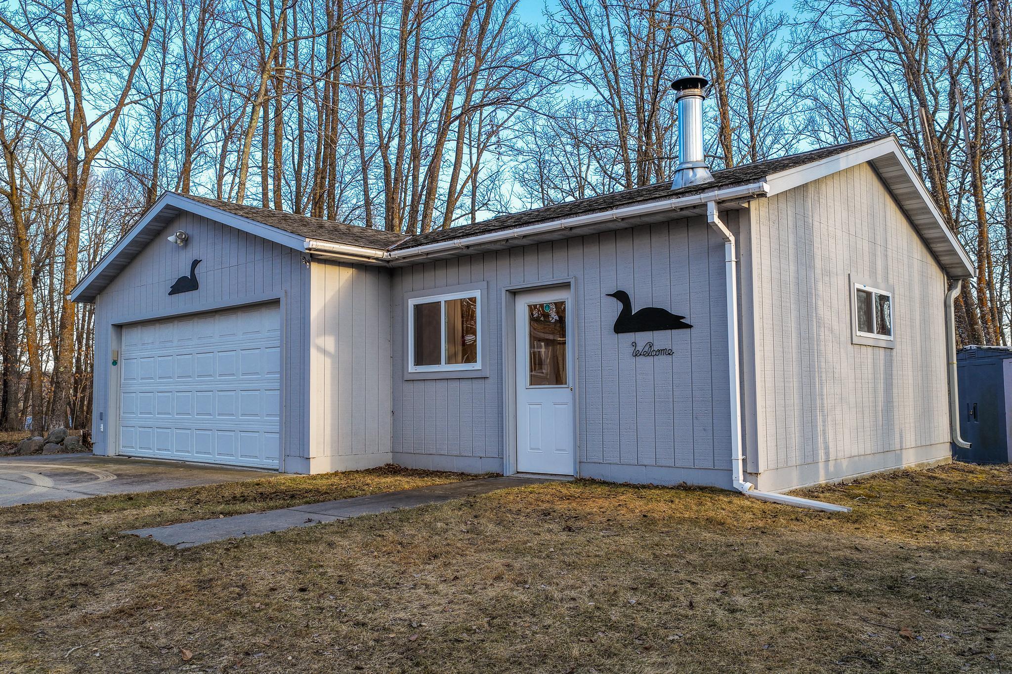 Double detached garage with a heated workshop!