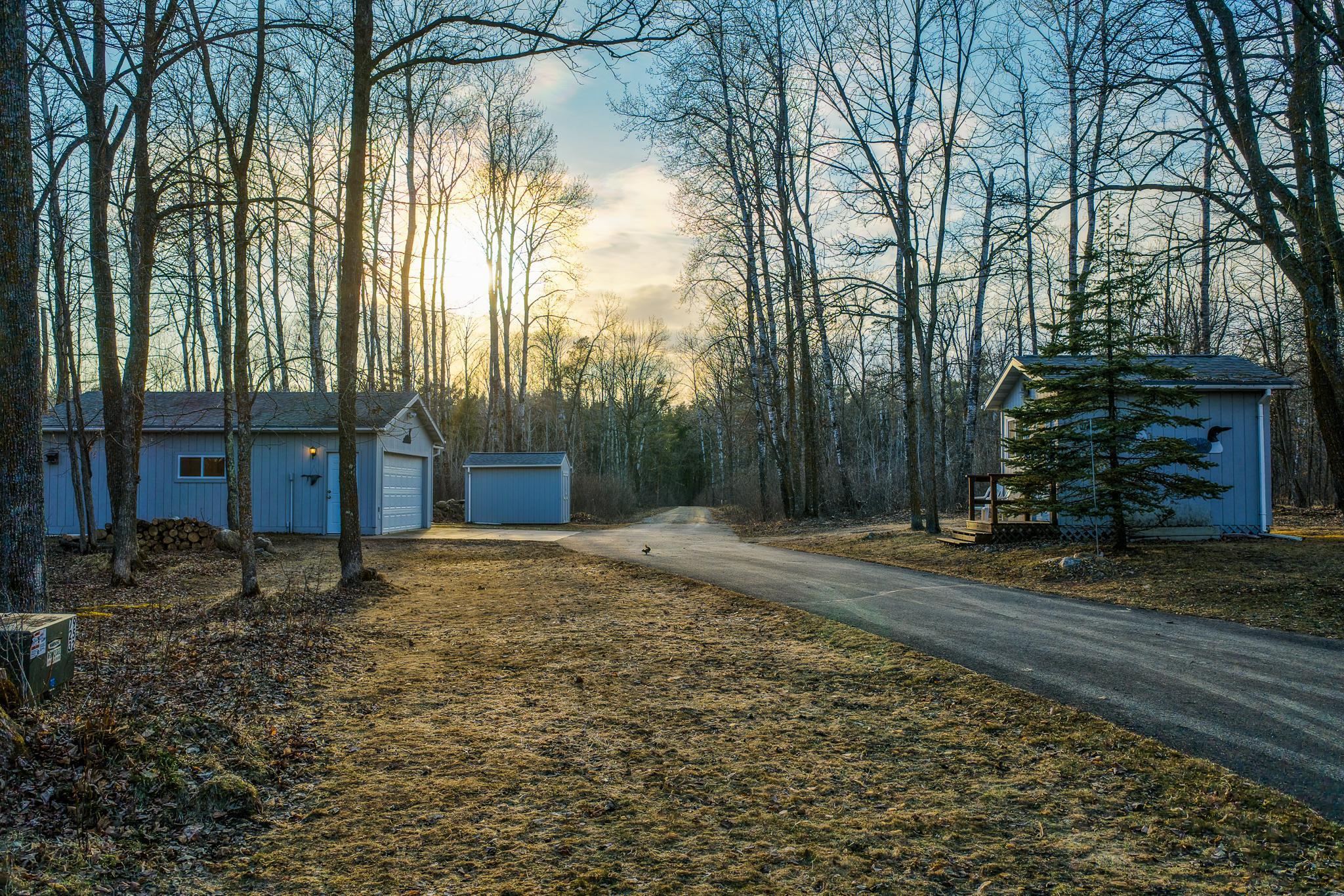 Tucked back off the main road, this Hennepin Lake hideway offers space and privacy