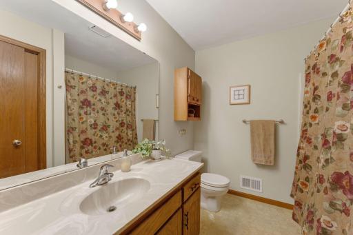 Upper-level full bathroom with tubâclean, bright, and calming