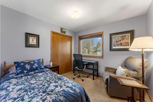 Bedroom #2 where florals soften the space and ideas find room to grow.