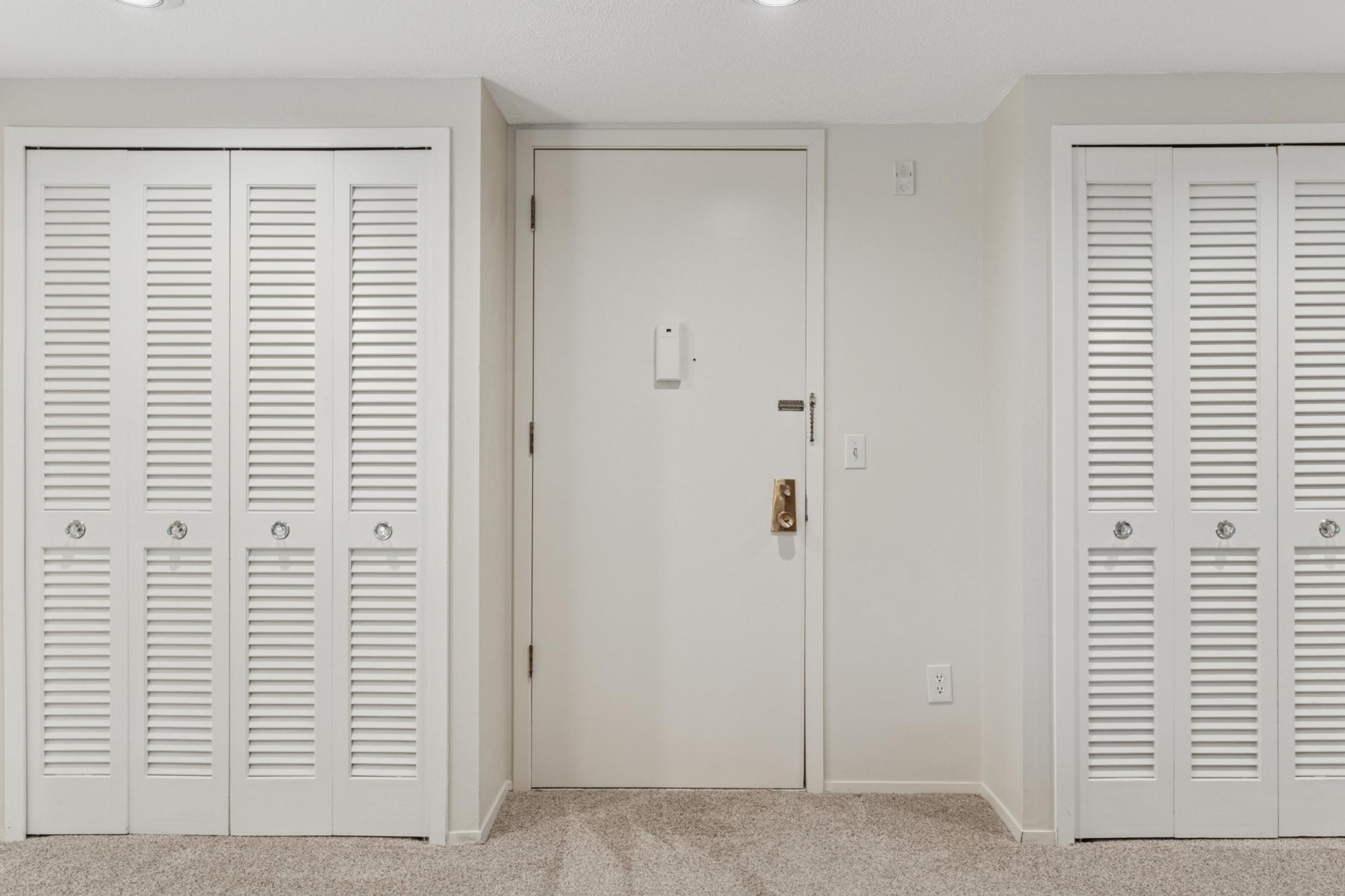 This home has lots of storage on both side of the front door.