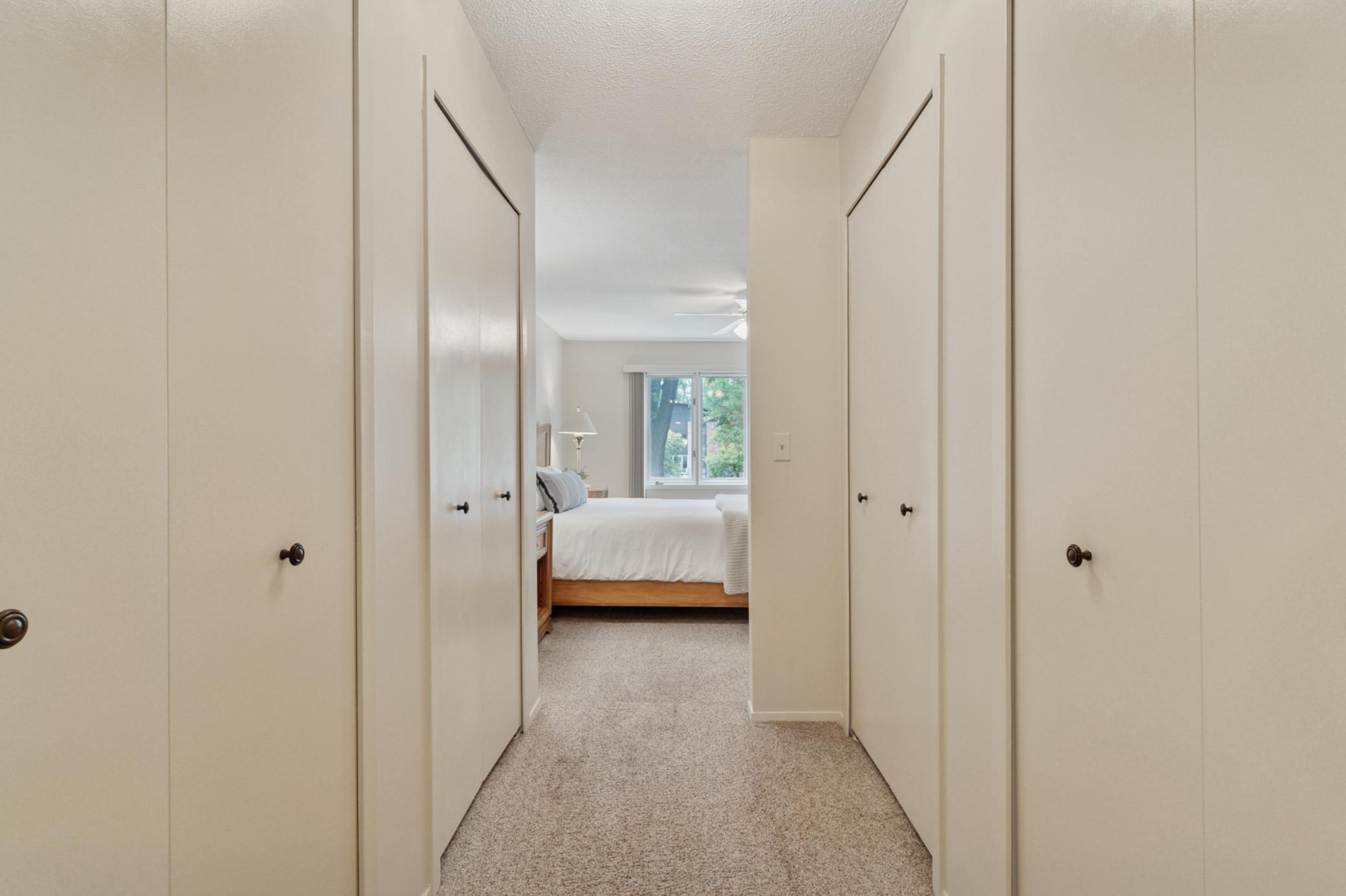 The primary suite has dual closets