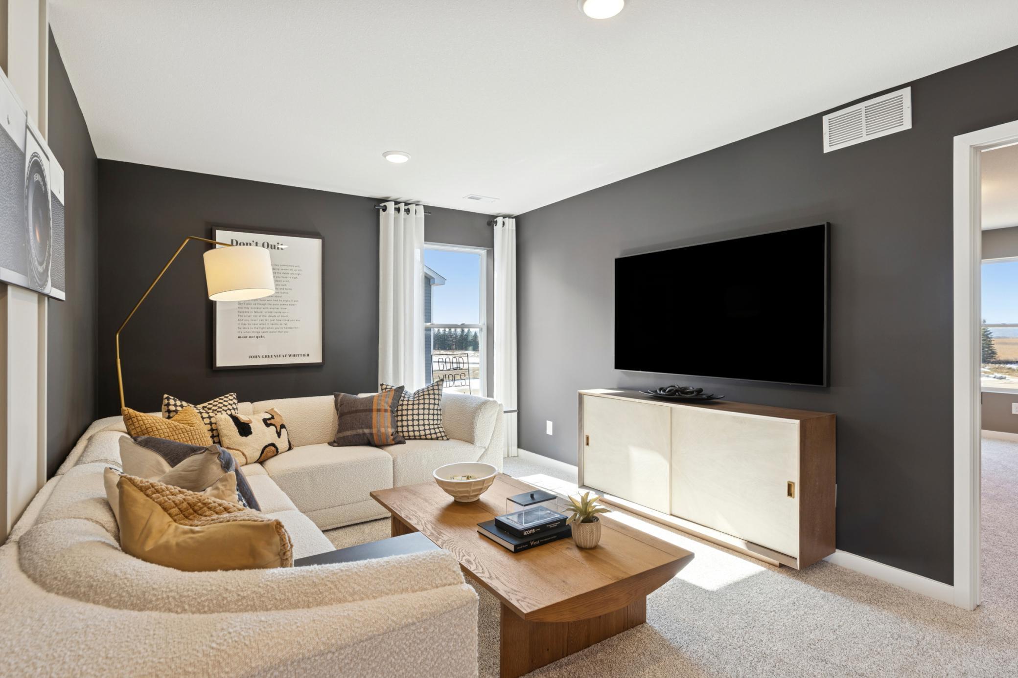 Loft’s open layout connects effortlessly to surrounding rooms, providing a bright and inviting upper-level retreat..jpg