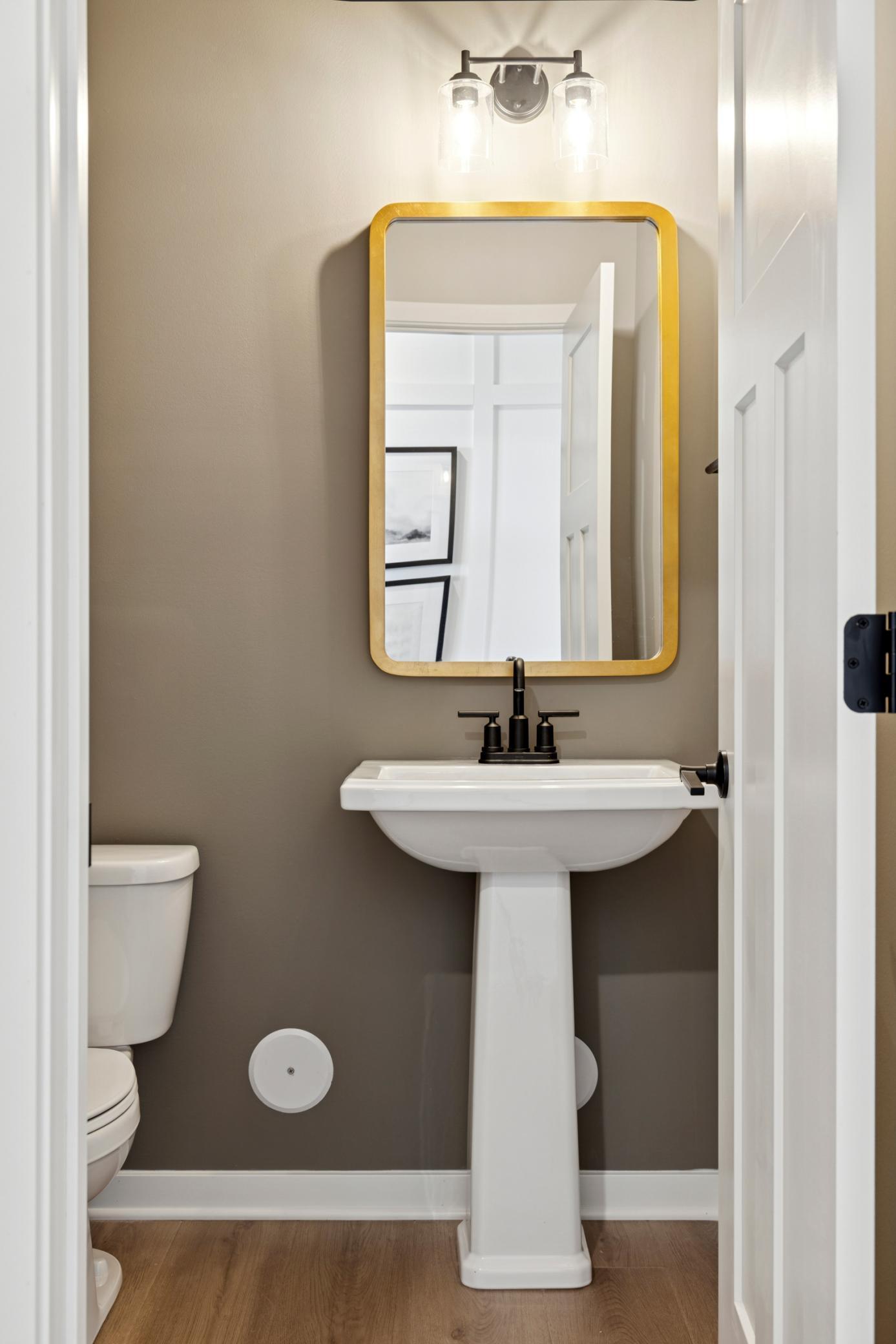 Half Bath conveniently located on main level..jpg