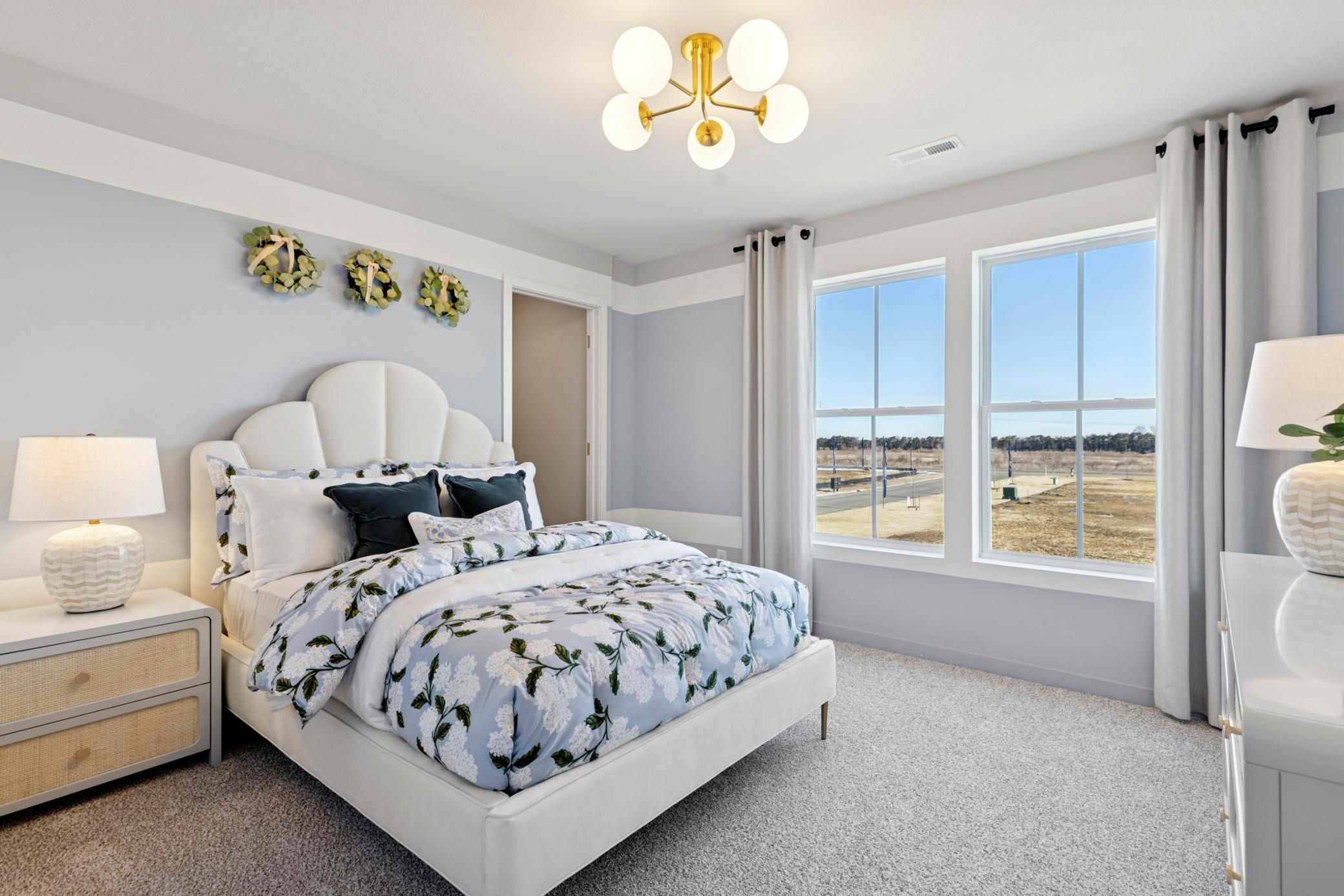 Generous space adds convenience and practicality, making this guest room equally suited for long-term stays or everyday functionality..jpg