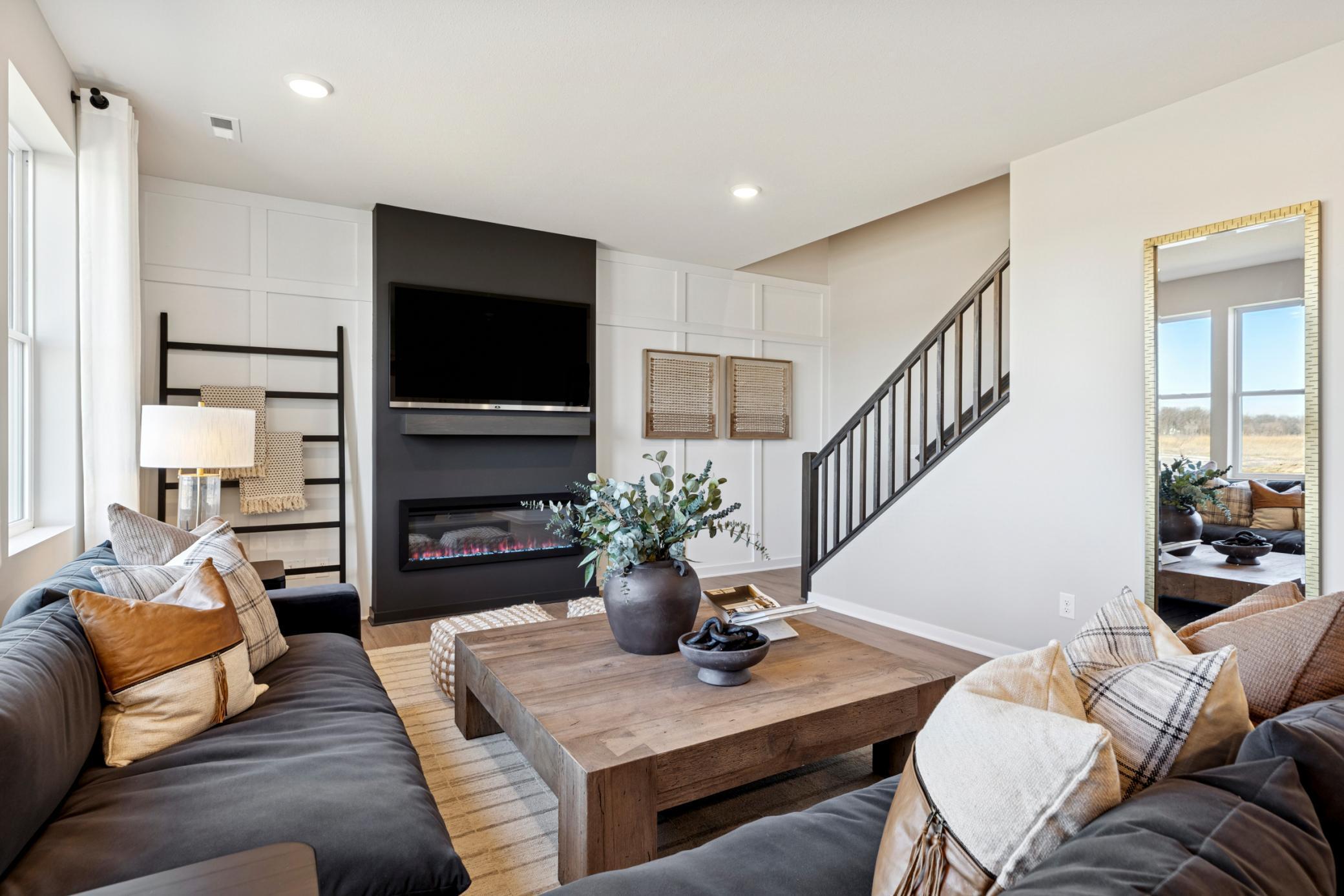 Open floorplan creates a seamless connection between the family room, kitchen, and dining areas—ideal for entertaining and family togetherness.jpg