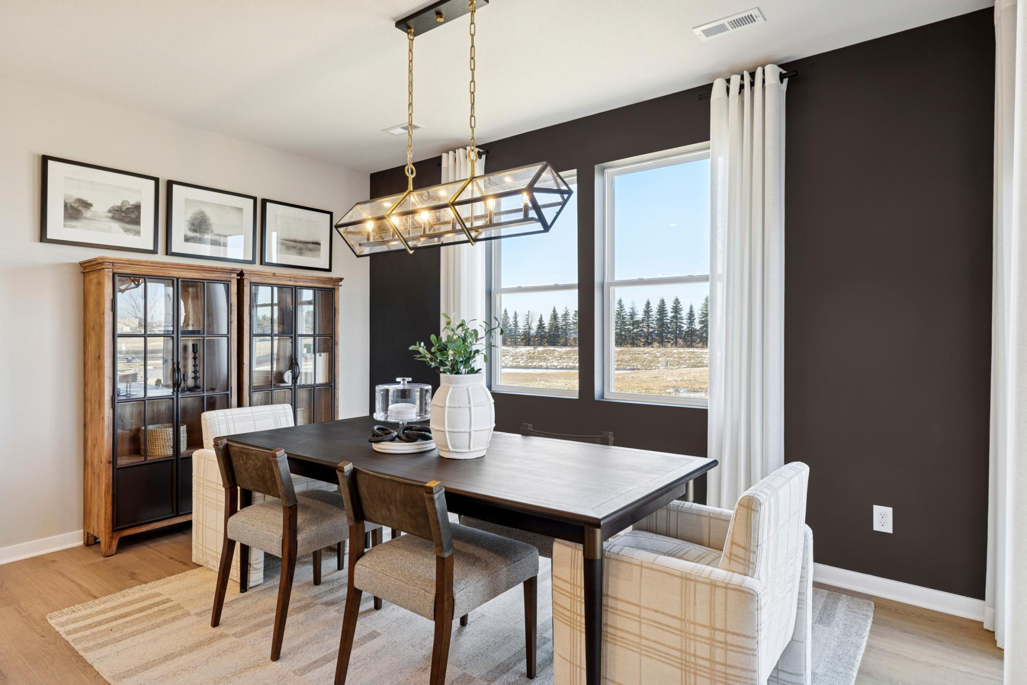 Your new dining room comfortably fits a full-size dining table with room to spare, great for hosting any event..jpg