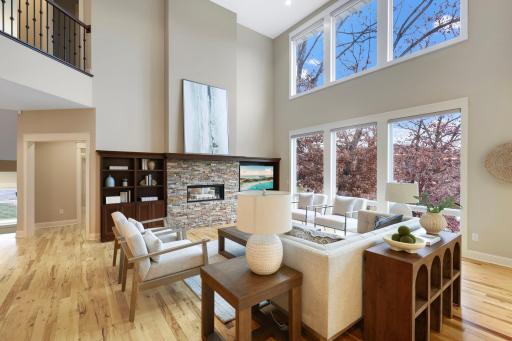 2 story great room with automatic blinds and gas fireplace