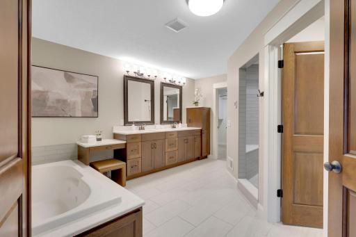 Primary bath with dual sinks, separate tub and shower