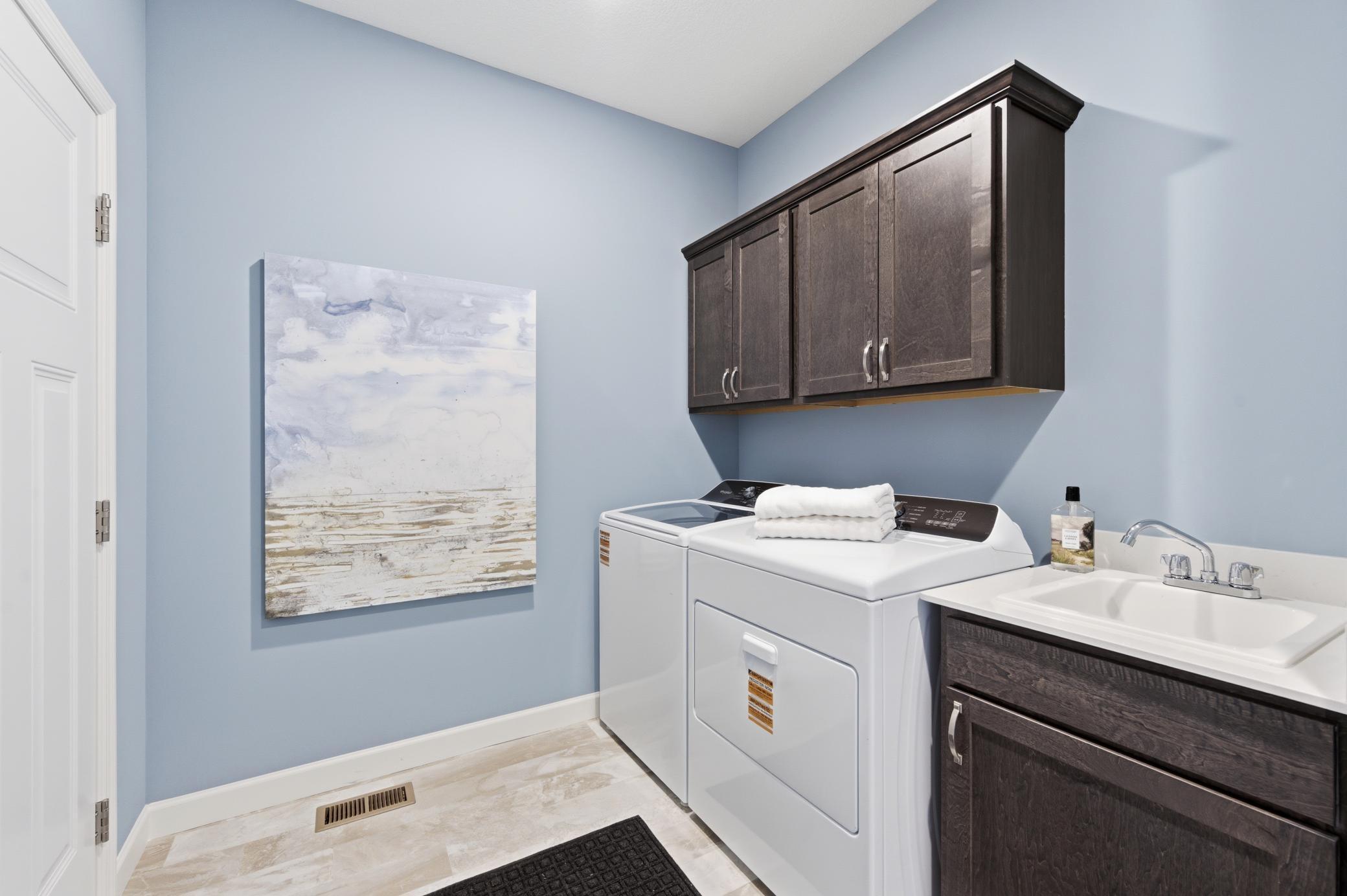 Main Level Laundry - The Edgewater at 916 Kepler Ave NE - *Photo from a previously completed Edgewater - finishes and selections will vary.