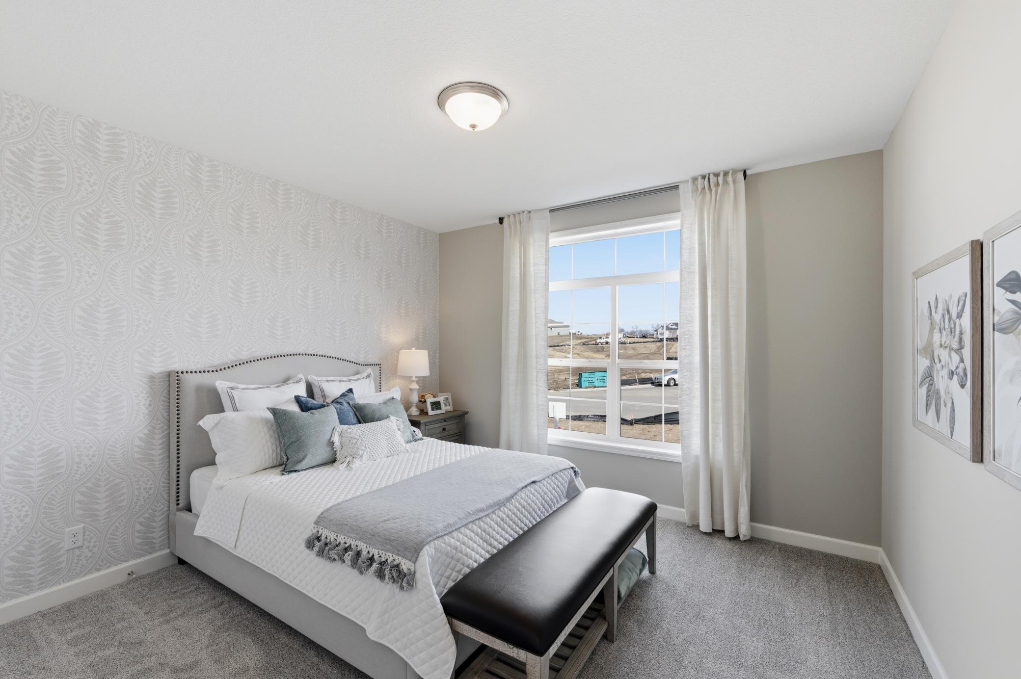 Main Level Bedroom 2 - The Edgewater at 916 Kepler Ave NE - *Photo from a previously completed Edgewater - finishes and selections will vary.