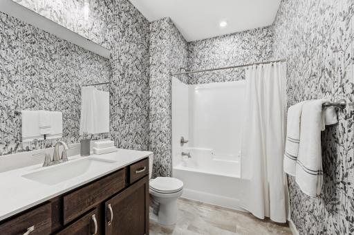 Main Level Full Bath - The Edgewater at 916 Kepler Ave NE - *Photo from a previously completed Edgewater - finishes and selections will vary.