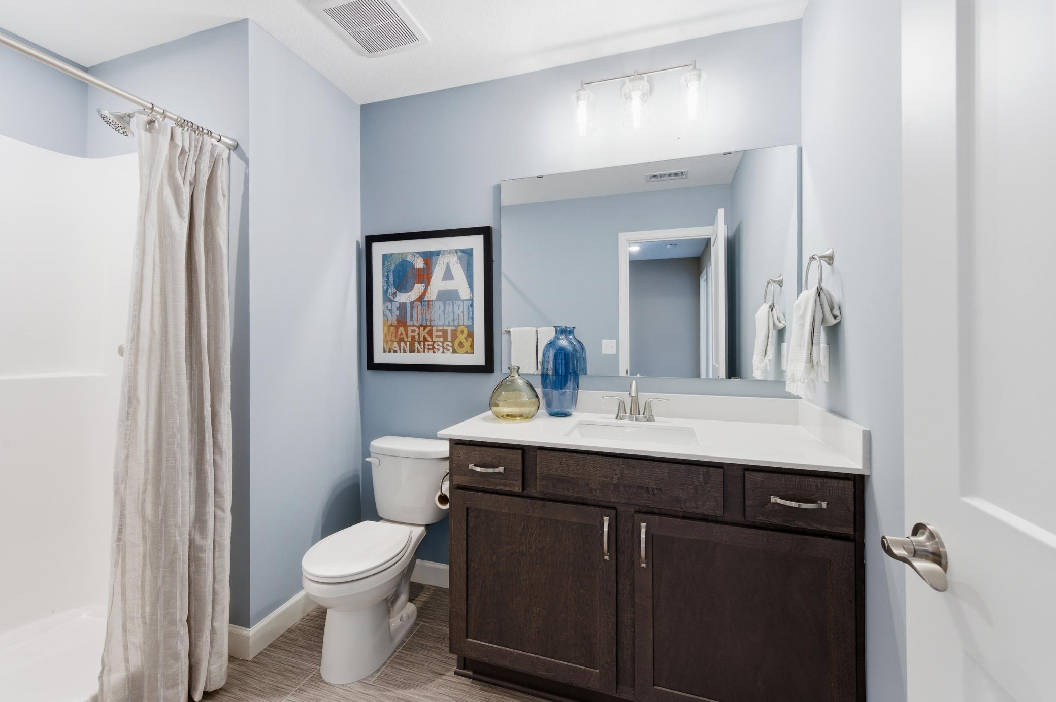 Basement 3/4 Bath - The Edgewater at 916 Kepler Ave NE - *Photo from a previously completed Edgewater - finishes and selections will vary.