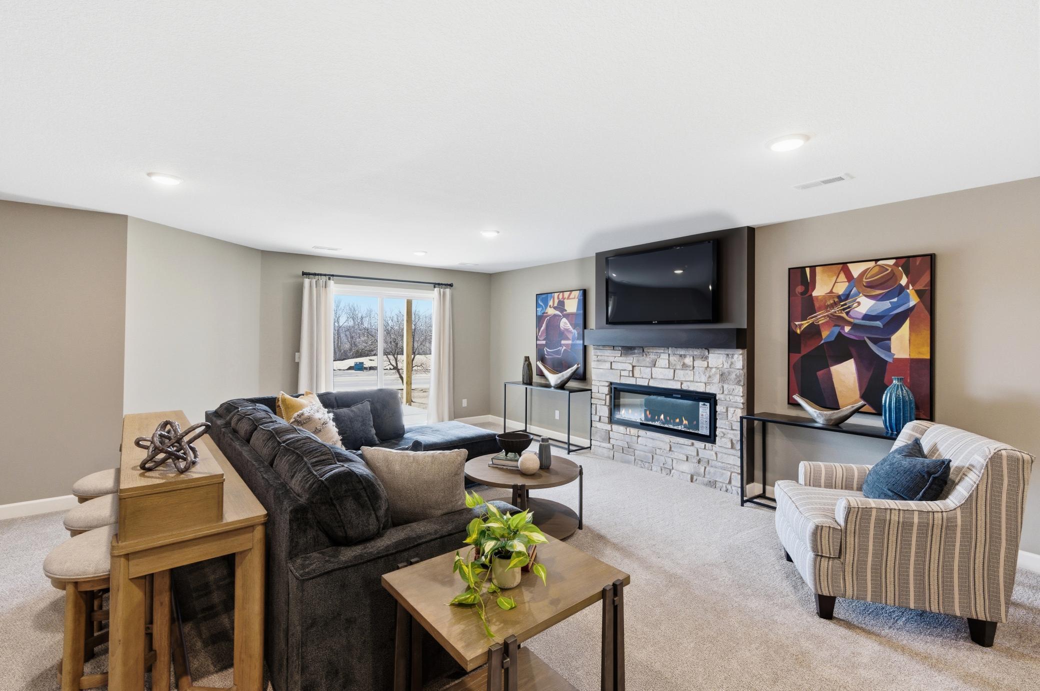 Basement Family Room - The Edgewater at 916 Kepler Ave NE - *Photo from a previously completed Edgewater - finishes and selections will vary.