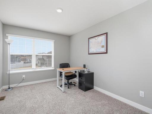 4th upper level bedroom currently used as an office