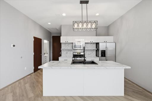 Sleek kitchen with modern cabinetry and a functional open layout.