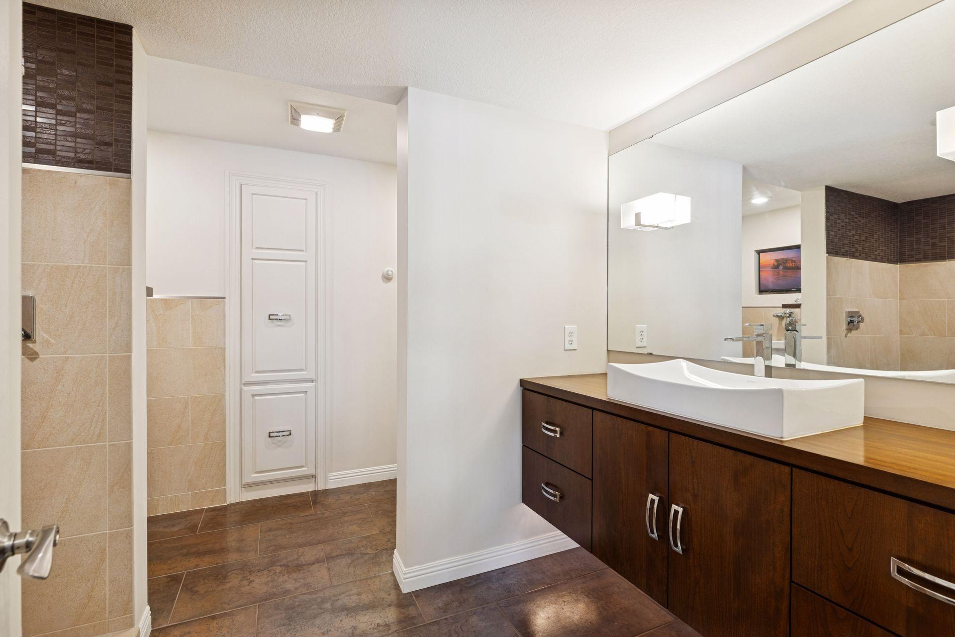 lower level 3/4 bath floating vanity and undercabinet lighting