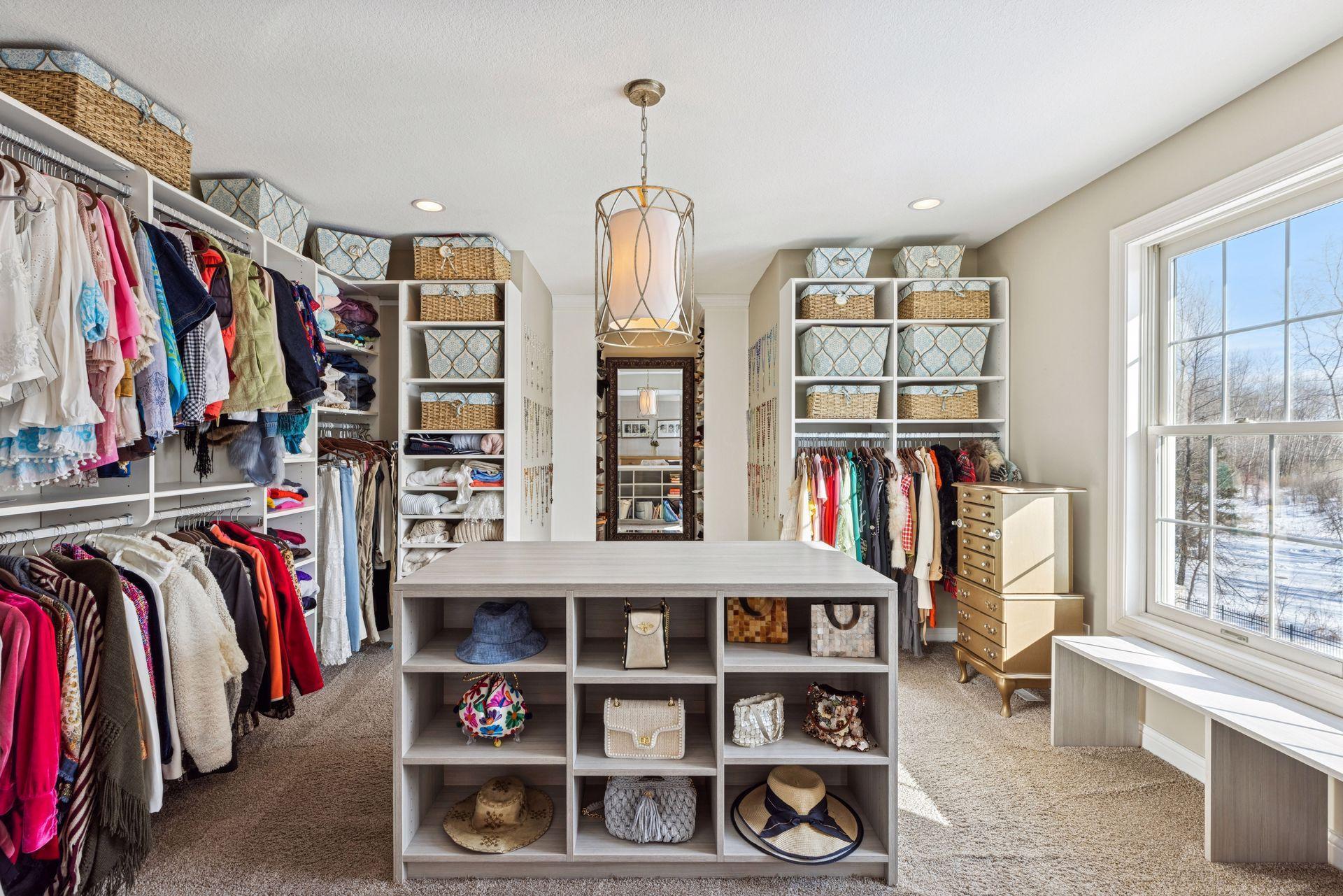 brilliant primary closet, one of two in gorgeous primary suite