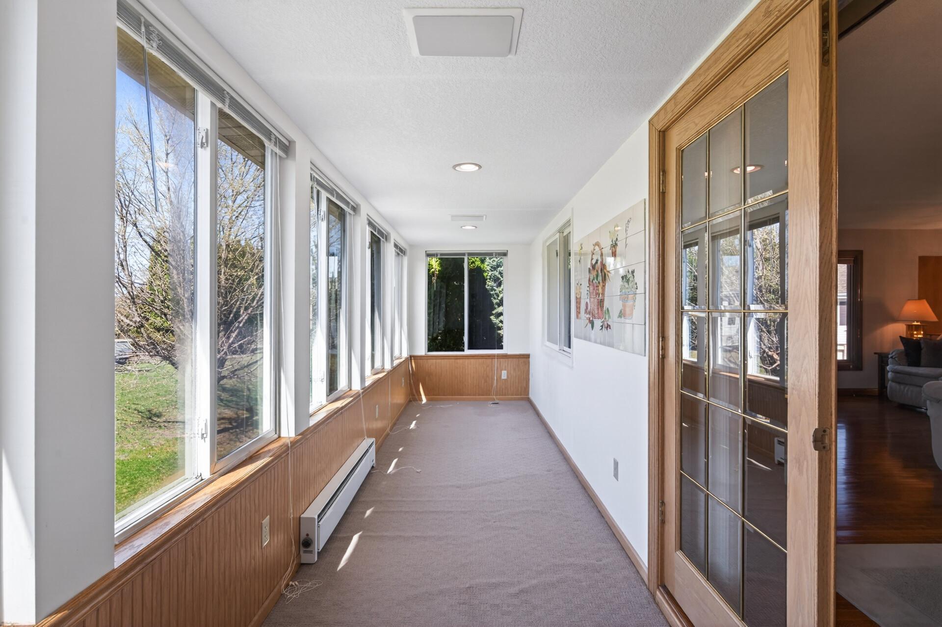 This porch space is one of the highlights. Both this building and unit are at the end of the complex, so you get a great spot to sit and watch the world go by, instead of staring at your neighbor!