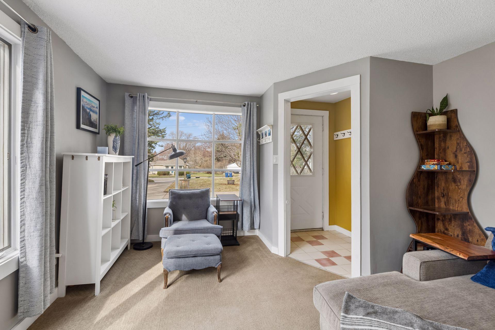 Bright and airy living room with large front window