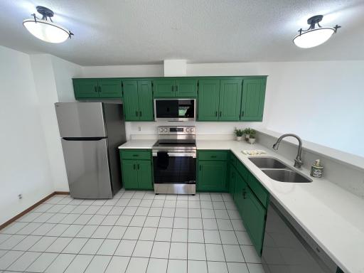 Updated Kitchen, brand new appliances, professionally painted, trendy color cabinets.