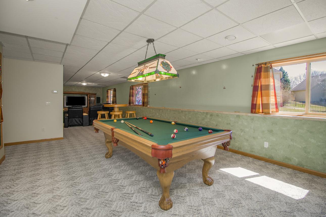 Lower level is ready for family and friends game night. (Pool table can stay.)