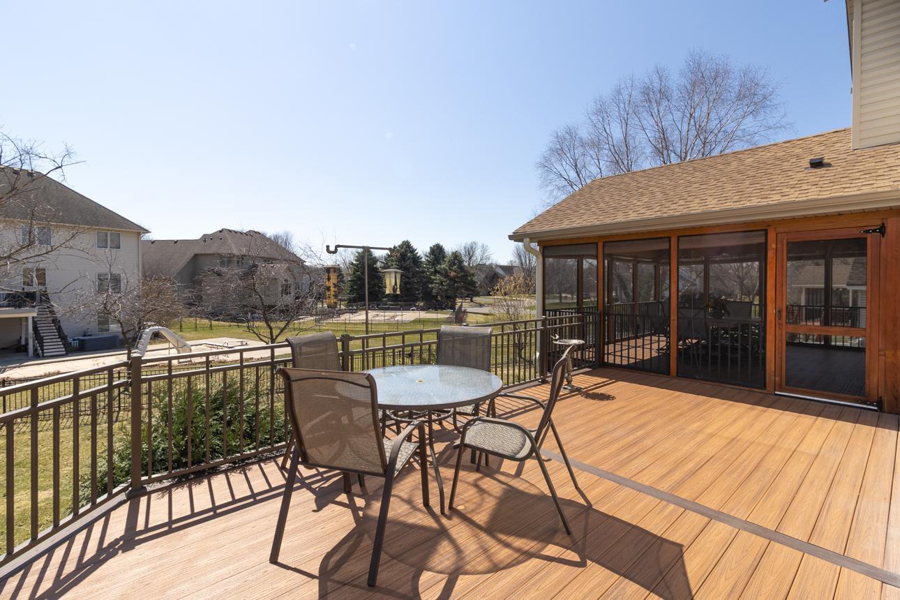 Huge deck with low-maintenance decking is an invitation to enjoy the sunny weather.